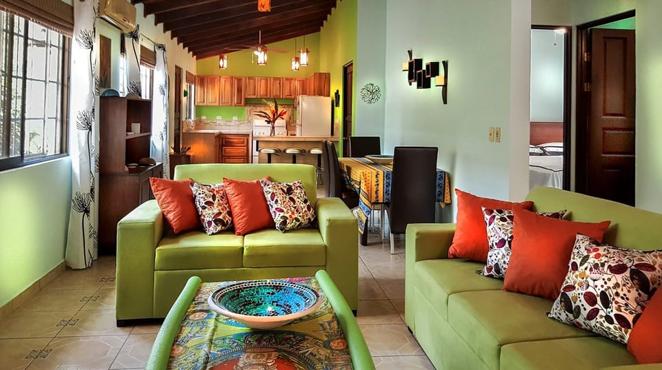 Bright and nicely decorated living, dining and kitchen areas.