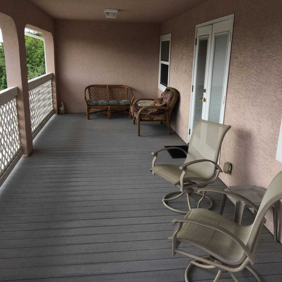 Covered 10 x 30 balcony off the Master Bedroom 
Relax and Enjoy!!
