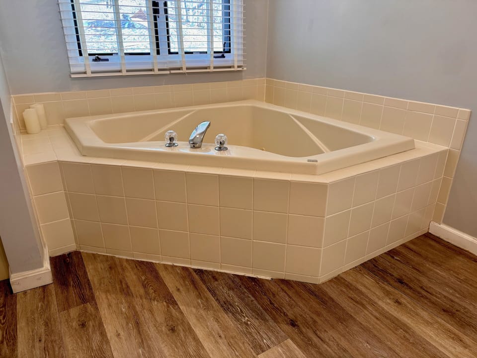Jetted bathtub in the master bathroom.