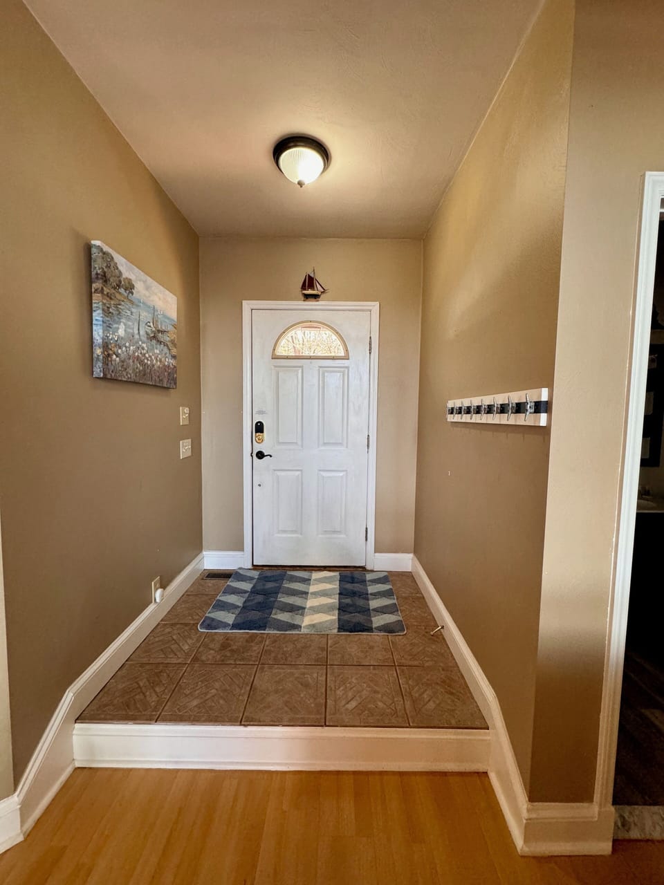 Entrance on the main level. One step from the door to the main floor