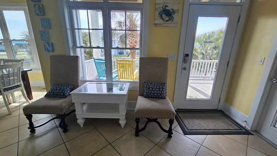 Sitting area near the kitchen and back door to the canal and park nearby