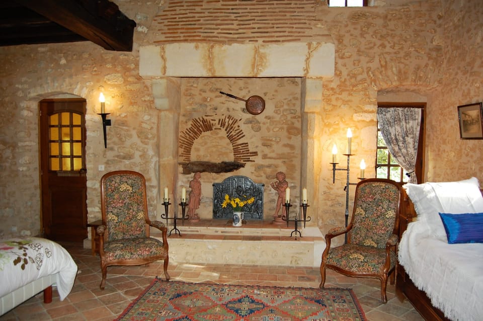Seating in cozy master bedroom.