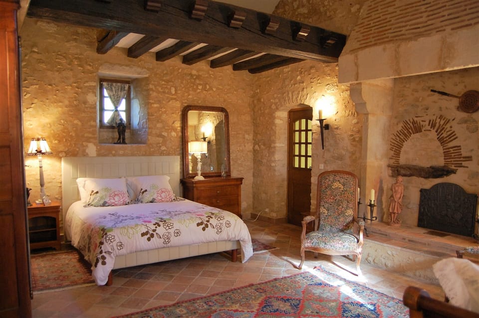 Master bedroom suite with a queen size bed.