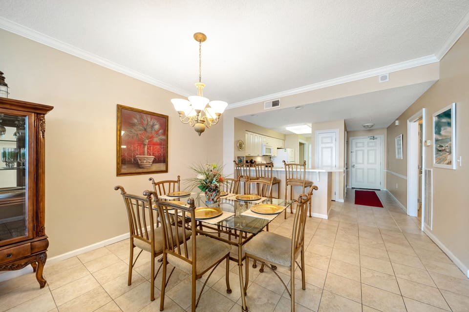 Dining area and kitchen bar. Seating for 9.