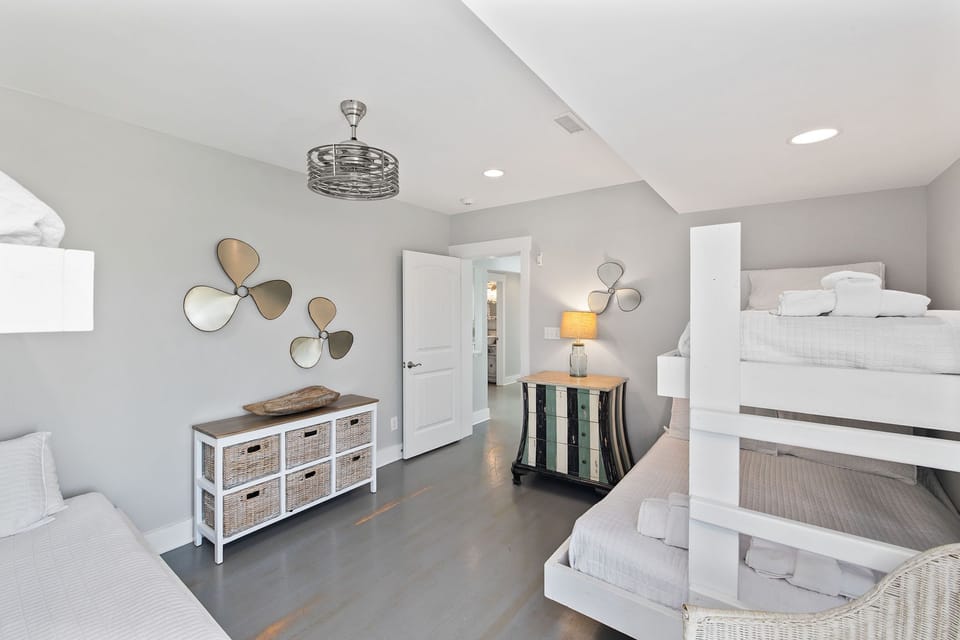 Downstairs bunk room - twins on top, doubles on bottom - with ensuite bathroom