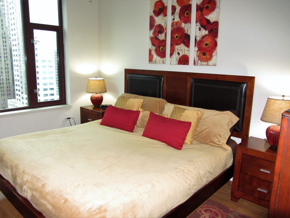 King bedroom with flat screen TV (out of shot)