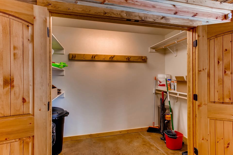 This storage room has ample room to store trash and ski equipment. The owner thought of everything!