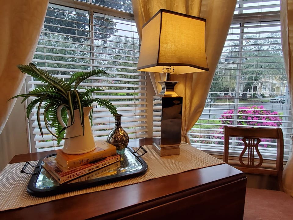 Nicely appointed home with a blend of antiques, original art, and modern decor.