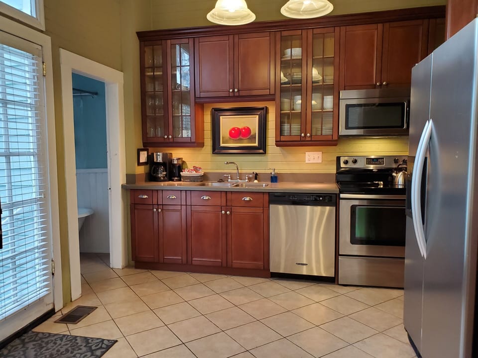 Kitchen is fully equipped to cook and serve a Holiday or special meal.
