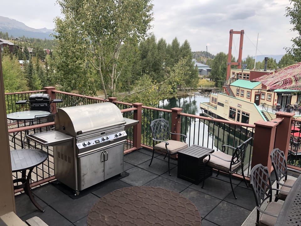 Back deck, exclusive to unit.  Not private, as neighbor units have decks also