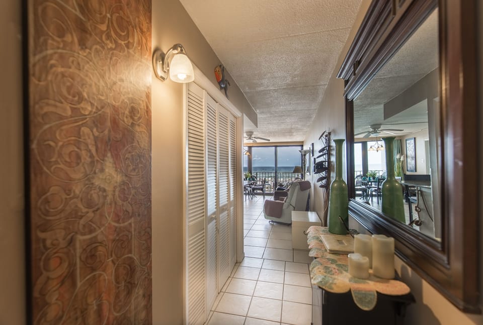 Hallway leading to the living room and balcony
