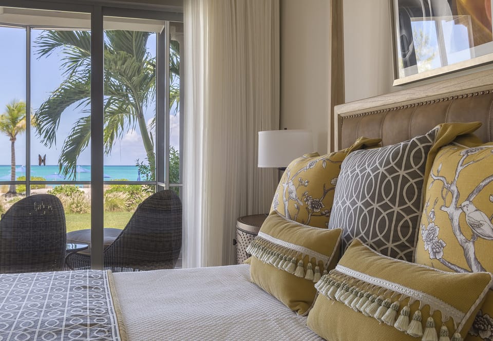 Close up of beautifully appointed master bedroom overlooking Grace Bay...
