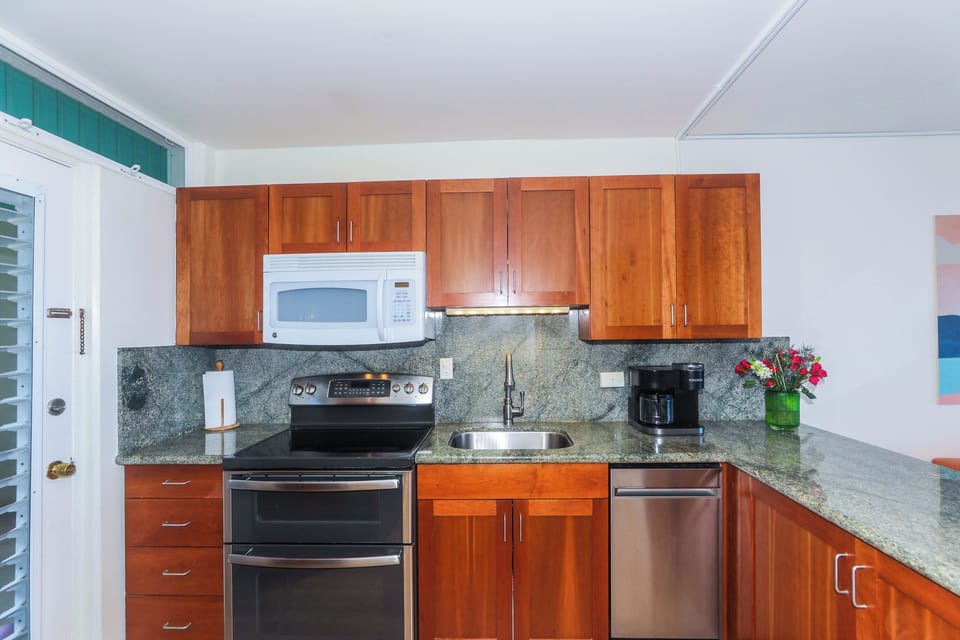 Double oven, Microwave, dishwasher and disposal.  On demand endless hot water