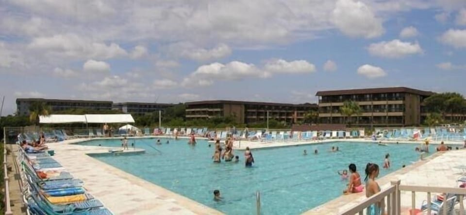 Oceanfront Olympic size pool, kiddie pool and Tiki Bar.