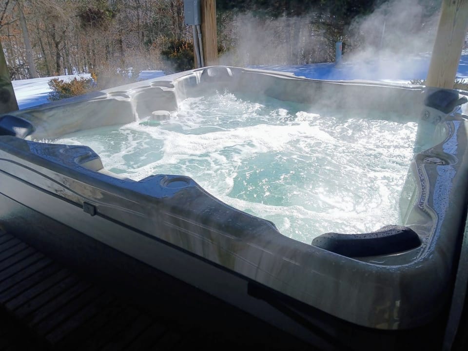 Brand new hot tub added in 2026, winter pic!