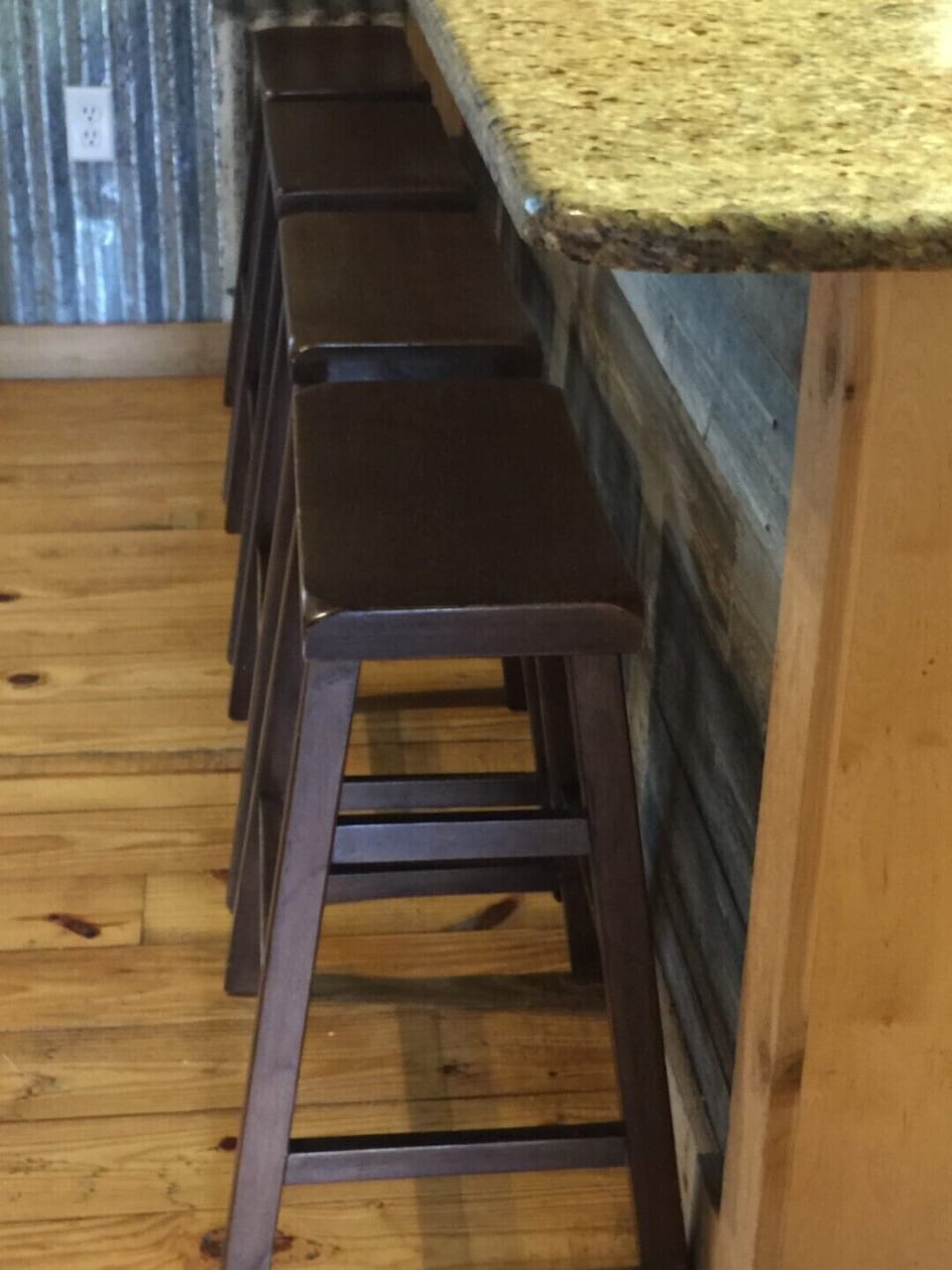 Rustic Retreat - Bar stools for easy meals.