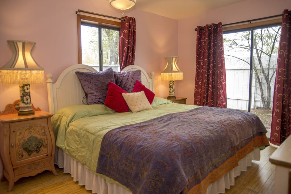 King Bedroom with sliding doors to private garden