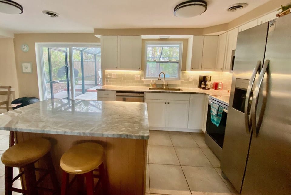 Kitchen opens to living room...