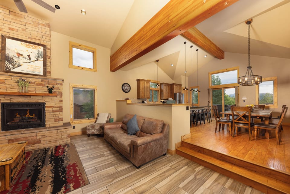 main living room adjacent to large kitchen/dining area
