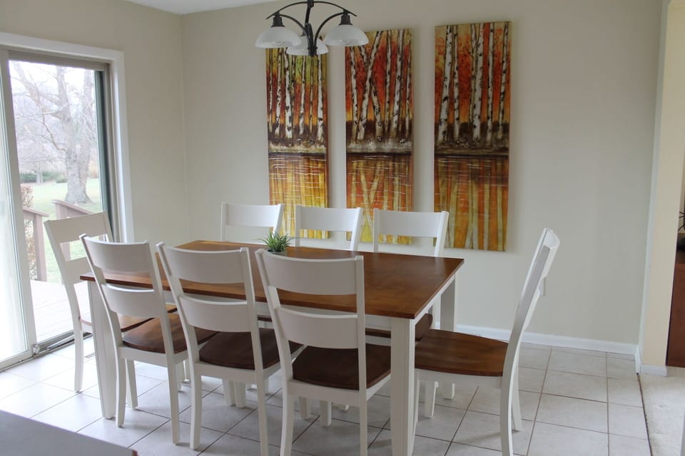 Dining room open double doors to deck