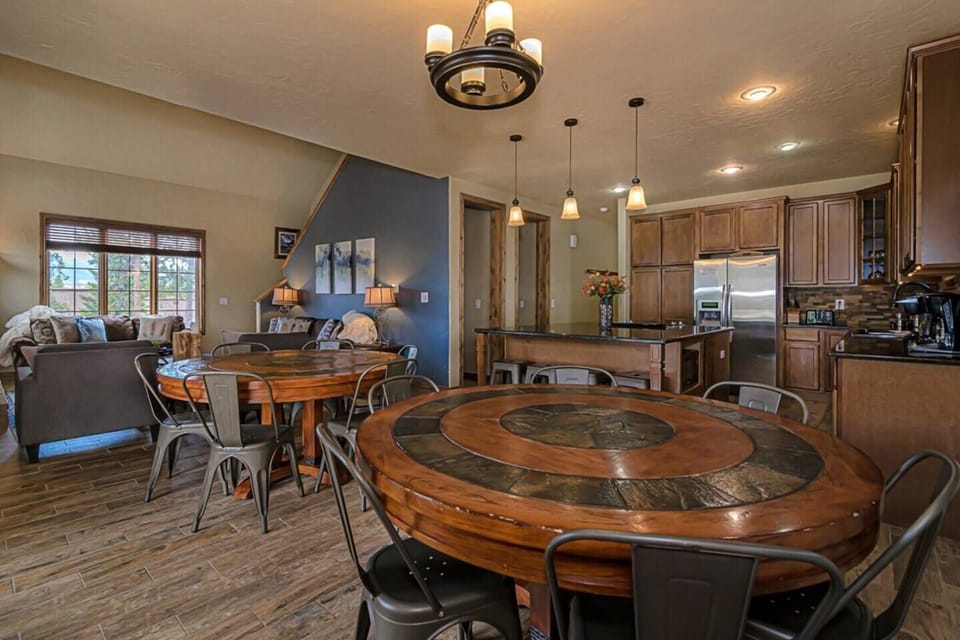 Seating for 12 at dining tables with additional seating for 4 at the bar.