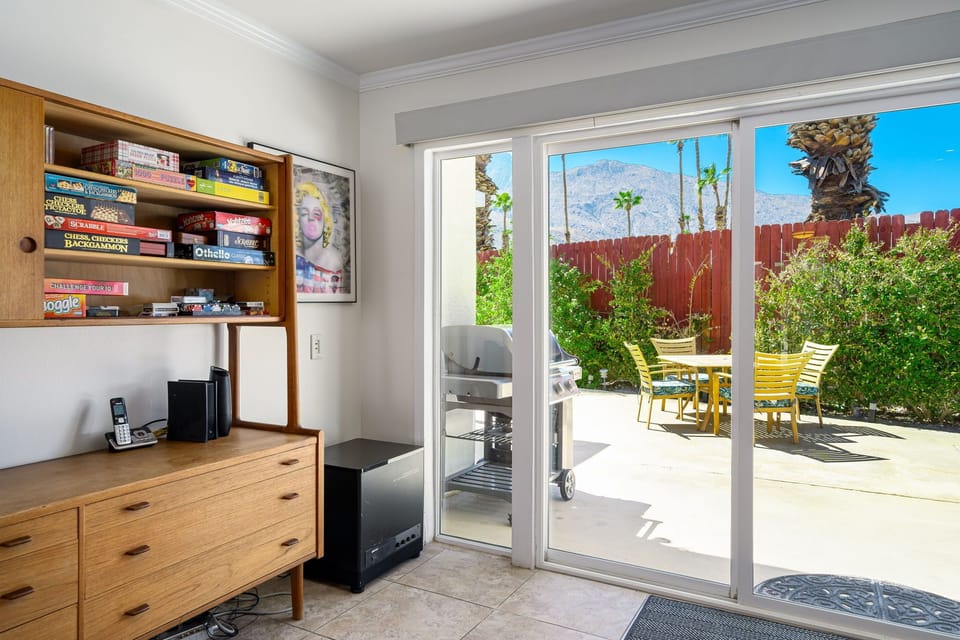 Living room,Antique cabinet, board games, double paned, alarmed, electric shades