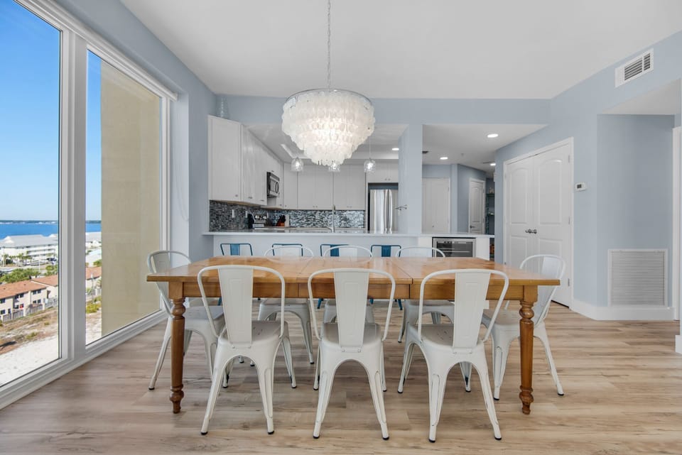 The open floor plan allows guests to seamlessly flow from kitchen to dining.