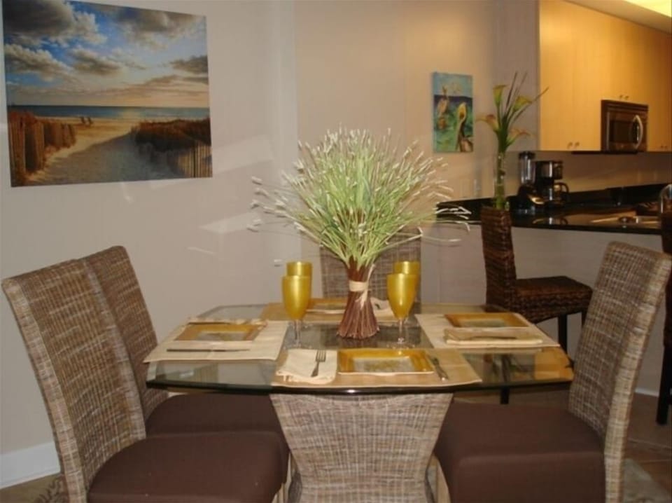 Dining area opens to living room and kitchen. 