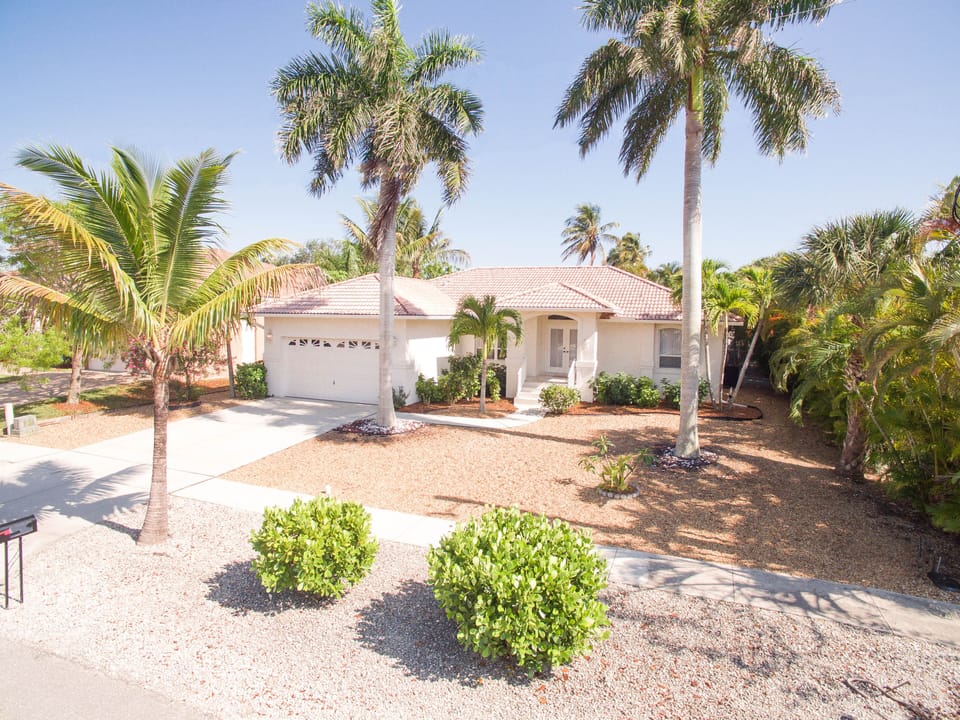 Front of home, located on quiet street, with full use of 2-car garage. 