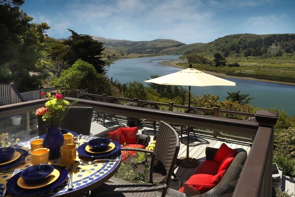 Al fresco dining with views just outside your door. The gated deck feels close enough to the river to bask in the vibe and touch the birds.