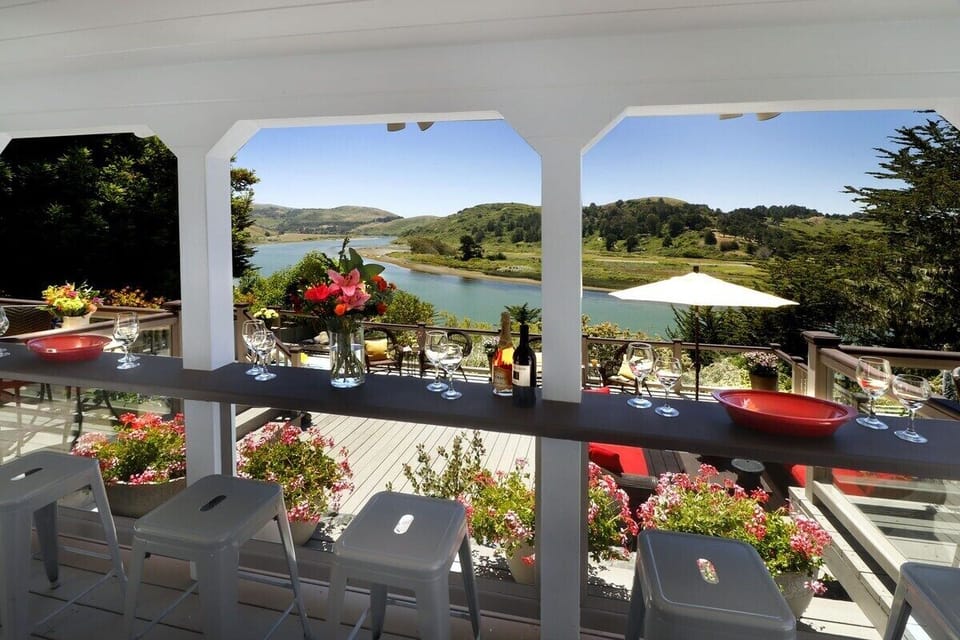 This is right outside the lower level and it’s a perfect place to have a cocktail or feed the kids hamburgers off the grill. The bar is undercover so it’s protected in case you need shade or it’s raining. Just sit and watch the kayakers paddle by…