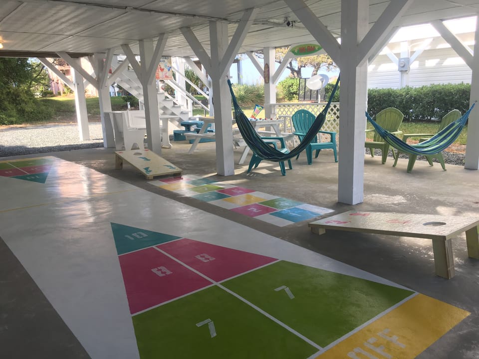 Under house game area provides hours of fun and relaxation! 