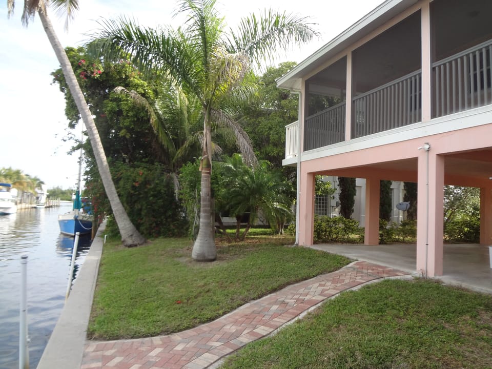 Backyard with private boat dock, room for your trailer too