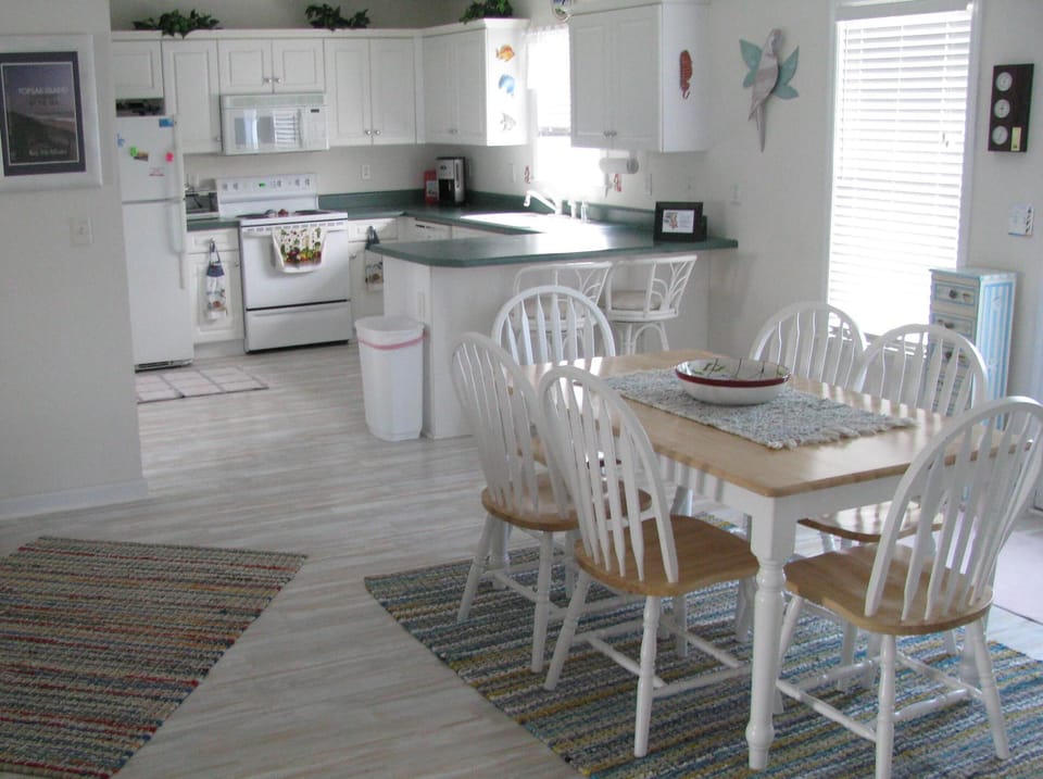 Dining table and kitchen