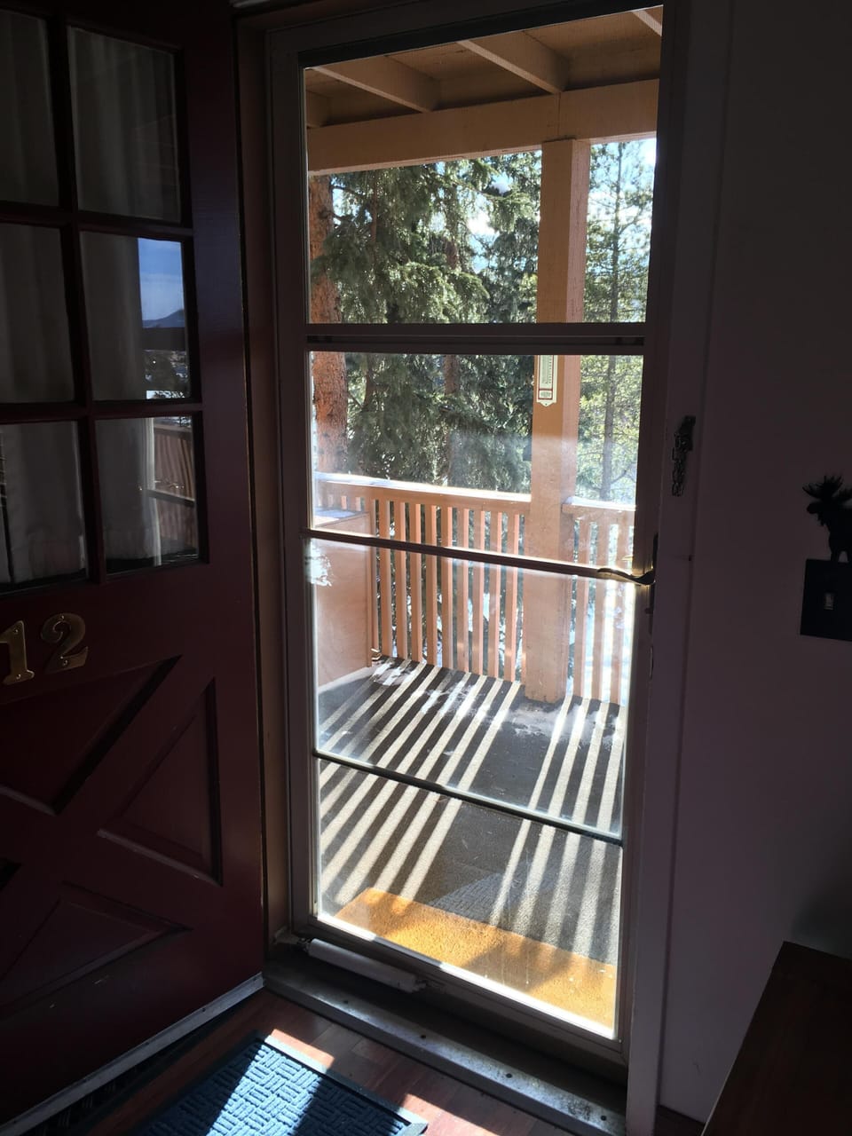 Front door looking out to the porch with Mountain View’s. 