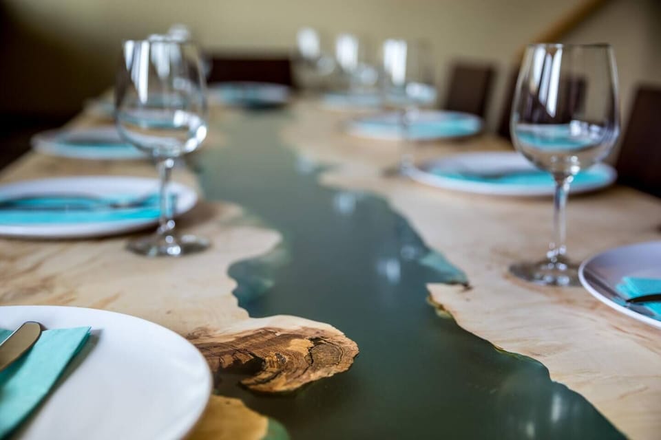 The river flows through the dining table for eight. 