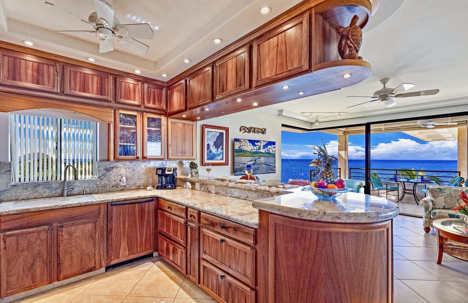 Enlarged no-fuss full kitchen .Well equipped for easy meal prep with great views