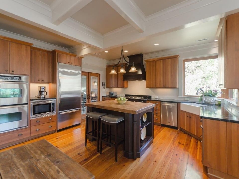 The porch is accessible through French doors from the kitchen.