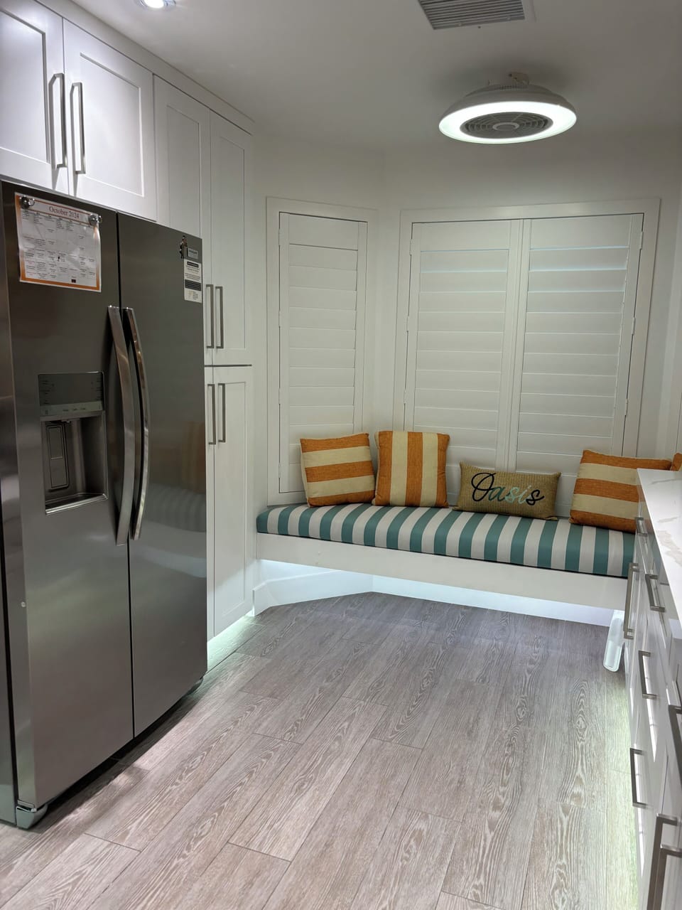 Custom floating bench with lights and plantation shutters