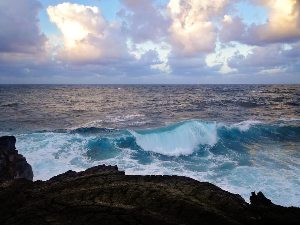 Walk to Kaloli Point to watch the sunset.
