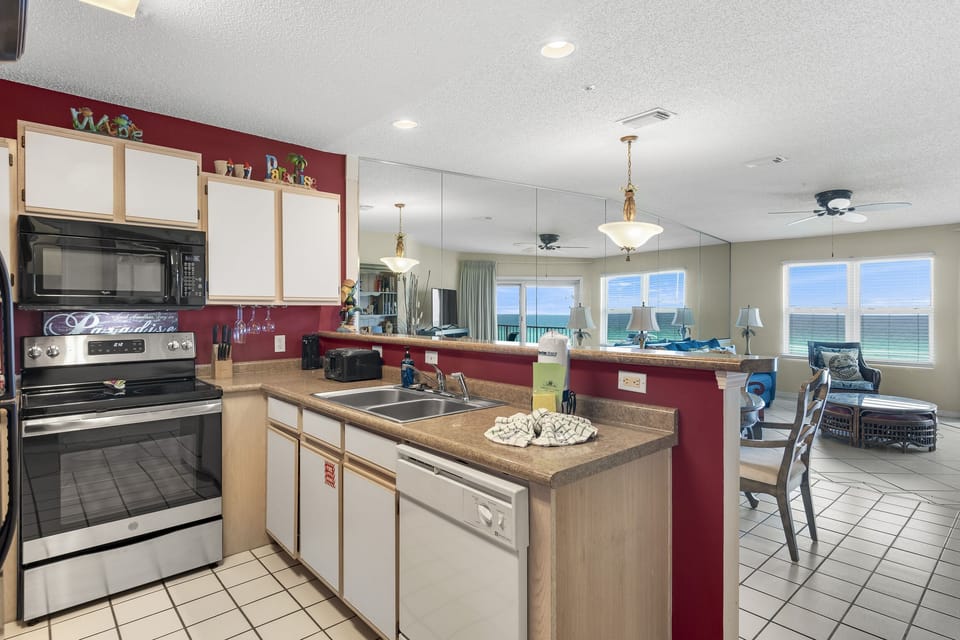 Prep meals with sweeping water views from the kitchen.