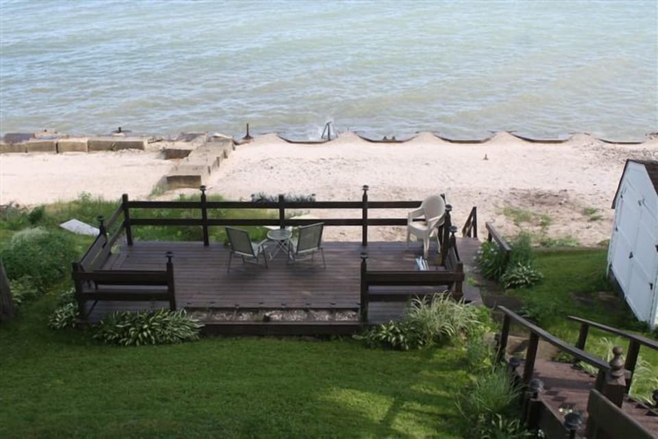 Note:  Breakwall constructed to stop erosion. Ladder over wall for beach entry.