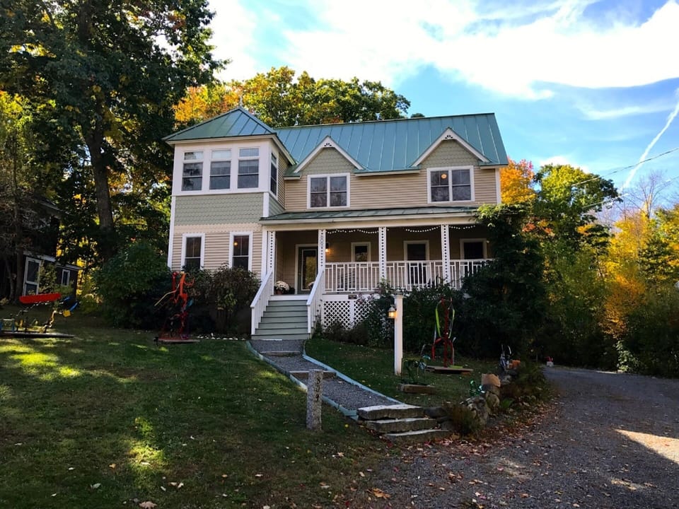 Front of house as seen from Shore Road. Charming, comfy, and cozy all year long.