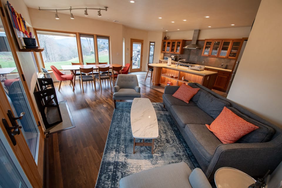Ground floor open plan kitchen, dining and living area w/wood-burning fireplace