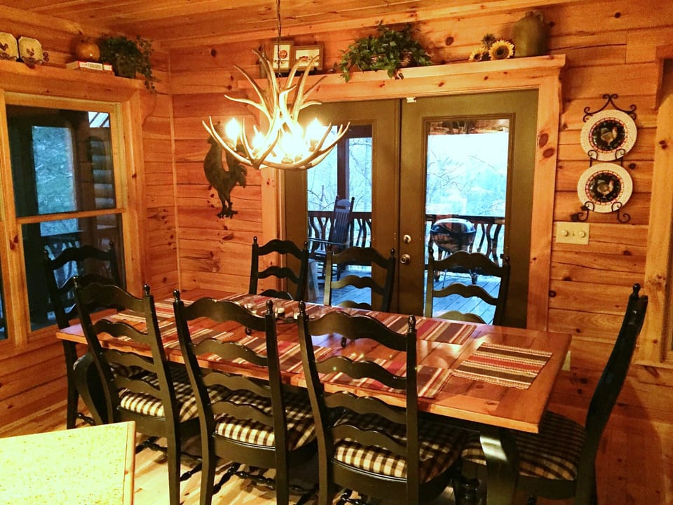 There is plenty of seating at the dining table, kitchen bar, or outside table.