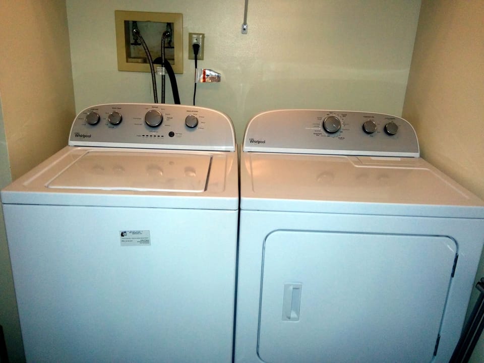 Pair of laundry washer and dryer machines