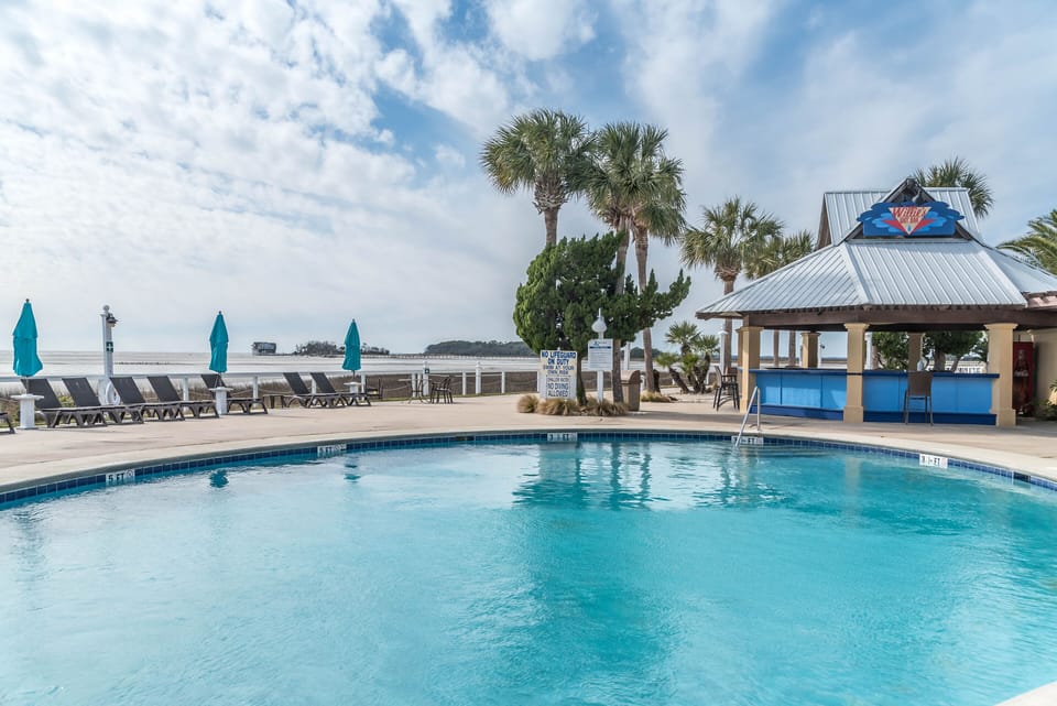 Cabana Club heated pool and Bar - Poolside Service from Cabana Grill