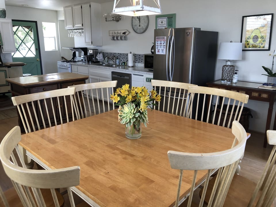 The kitchen table seats 8 for formal or informal dining.

