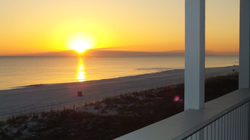 Gorgeous sunsets seen from the covered, oversized, wrap-around balcony.
