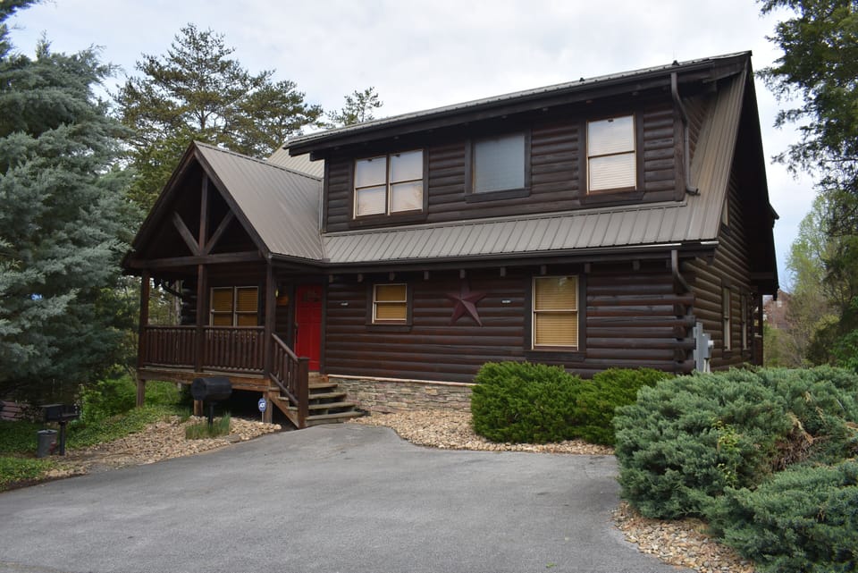 Cabin - Front - Parking for 3 cars or 2 SUVs. Additional parking to left.